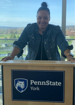 Karin Neal at a podium that says Penn State York